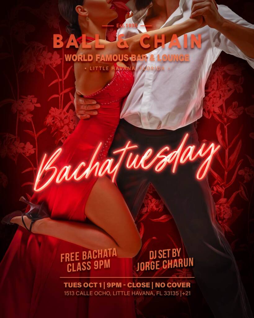 woman in red dress dancing bachata with man in white shirt and slacks