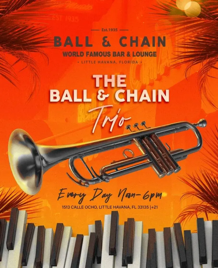 Trumpet floating the air over a disjointed keyboard on a red background with tropical foliage