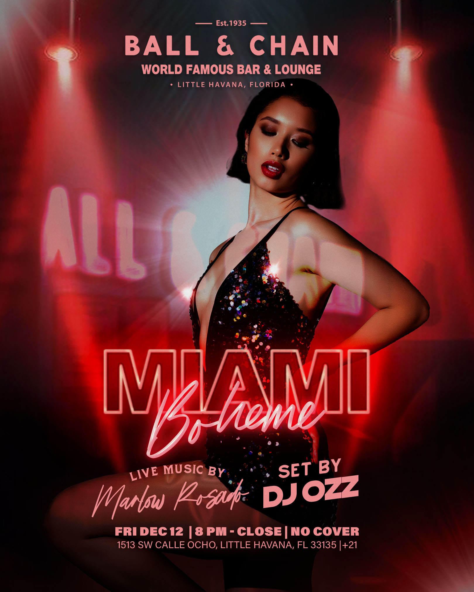 woman in a black drop cut strapped dress dancing sexily