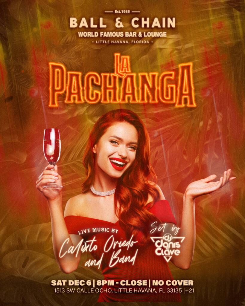 Girl holding a wine glass in her hand smiling shrugging