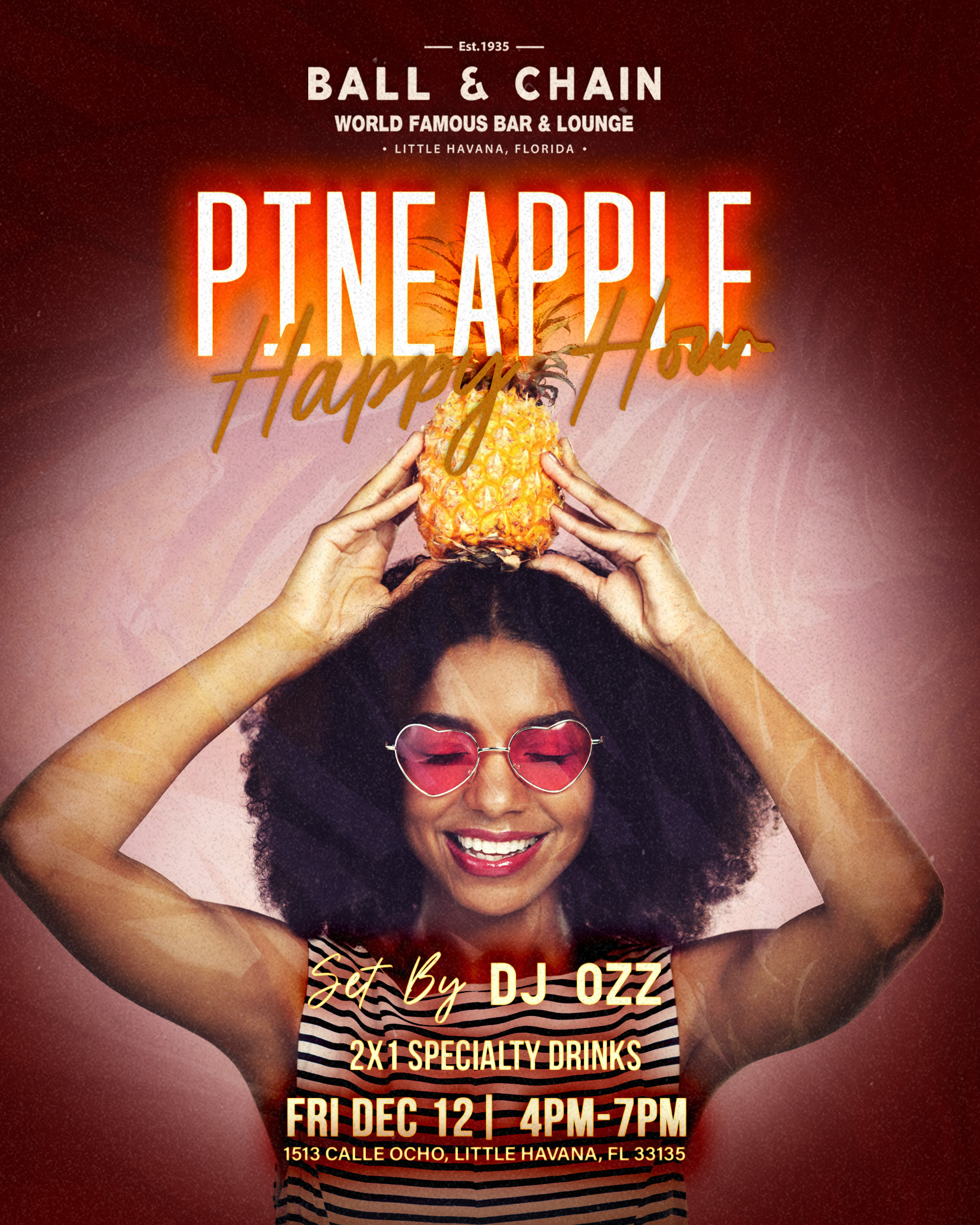 Woman smiling holding a pineapple on top of her head