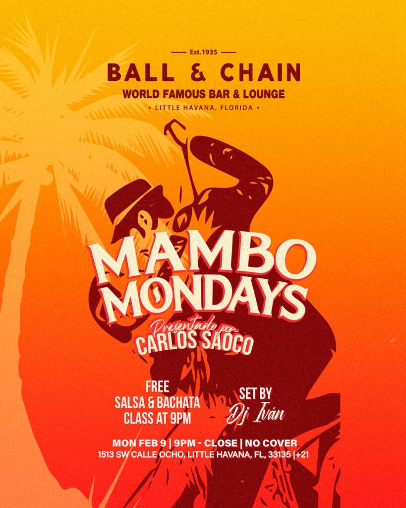 silhouette of a palm tree and a man dipping a woman dancing