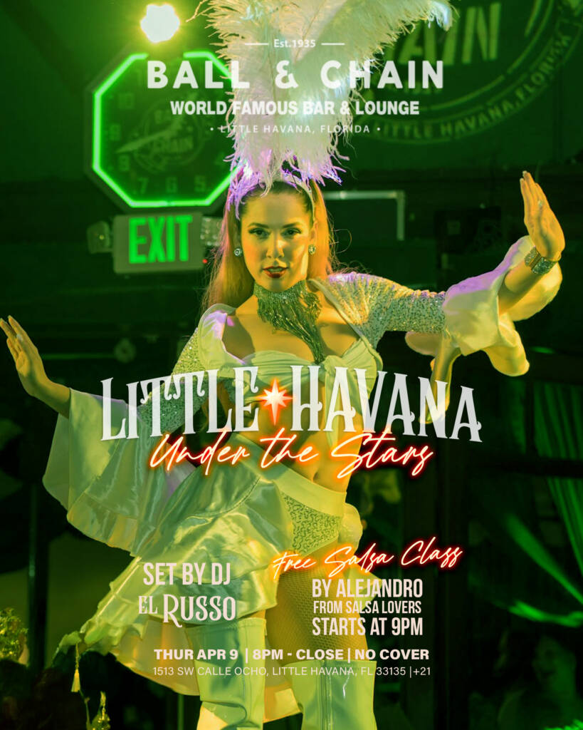 showgirl with headdress on stage