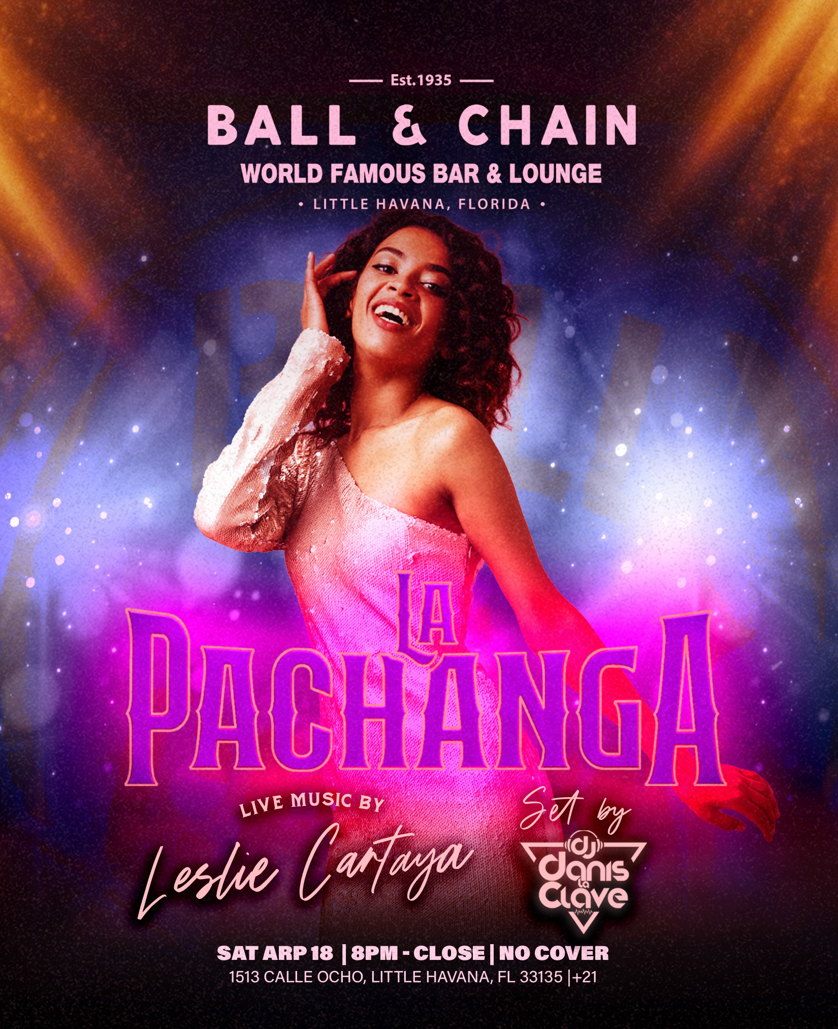 woman smiling and dancing in front of bright lights