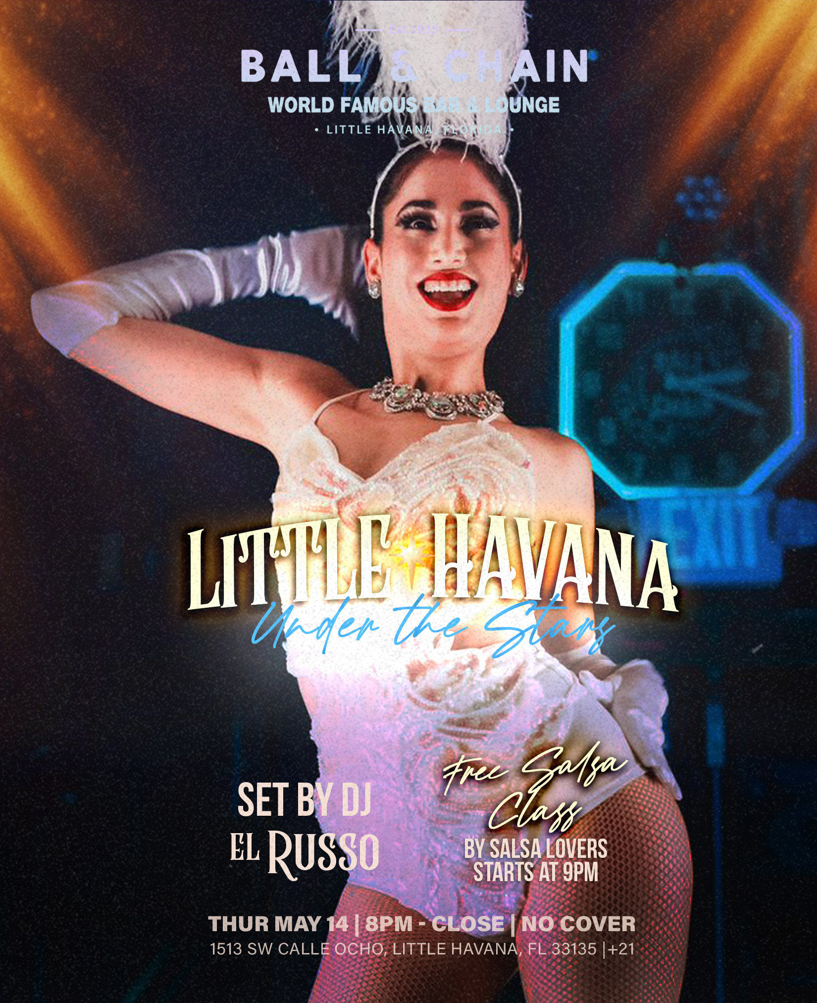 showgirl in white on stage smiling