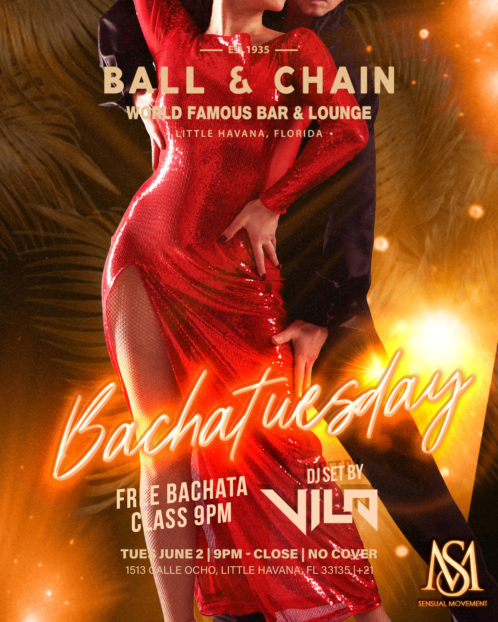 woman in a red dress and man in a black suit dancing bachata