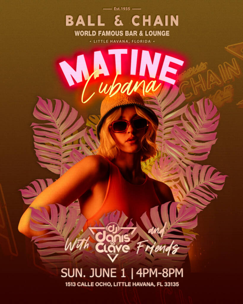 woman with sunglasses and a fedora standing in front of palm fronds