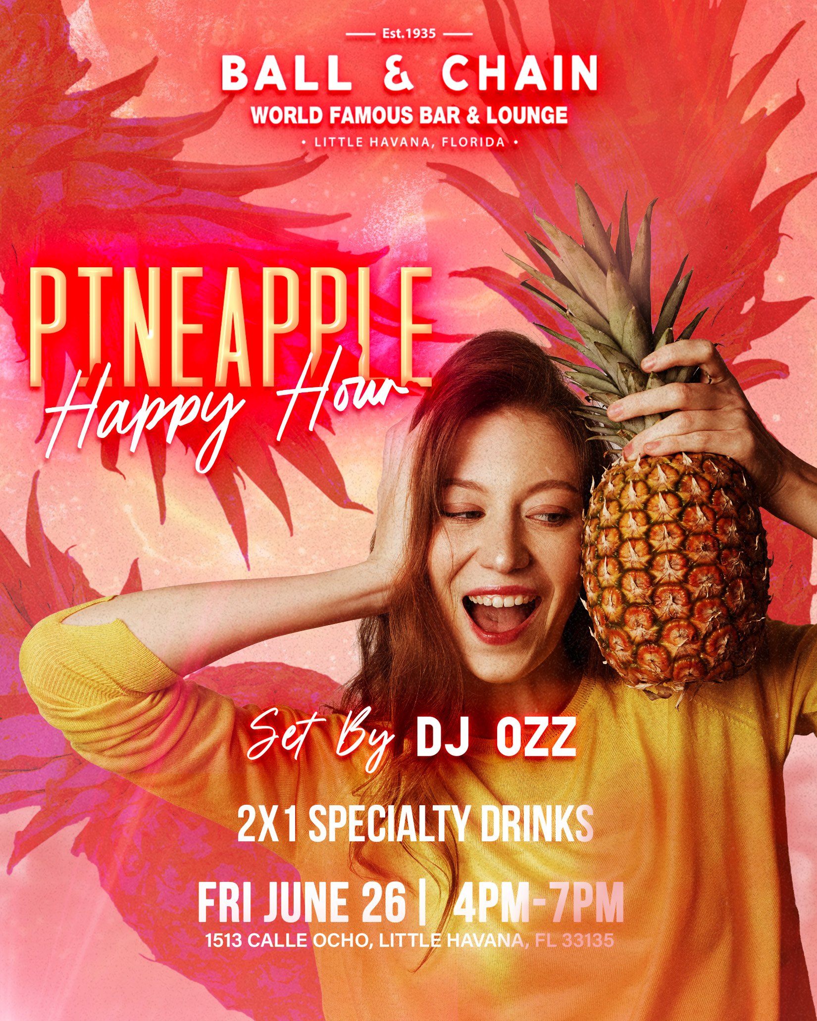 Woman with a pineapple on her shoulder laughing