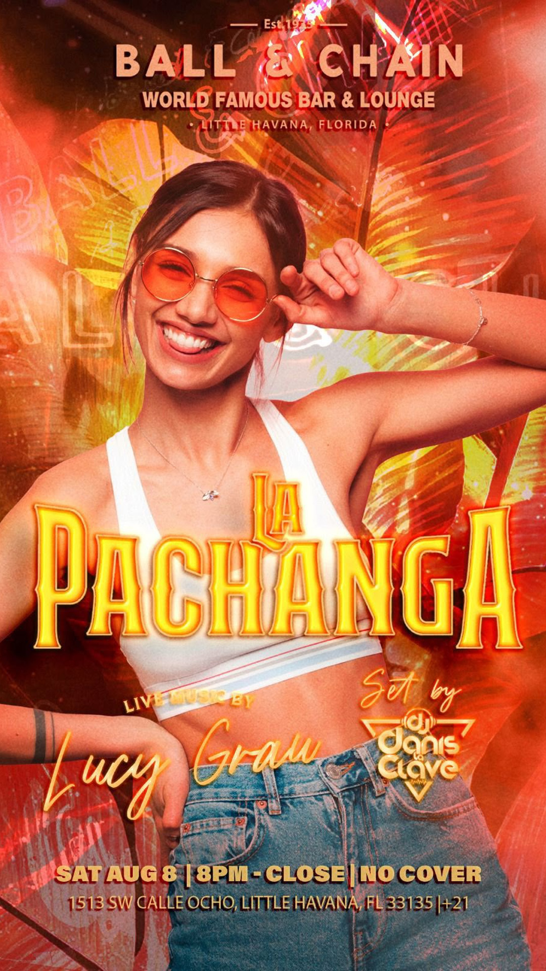 smiling woman in a halter top and jeans dancing
